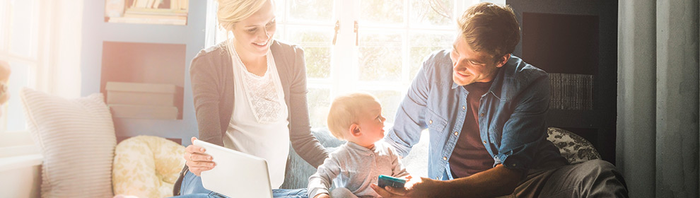 couple with young child in livingroom